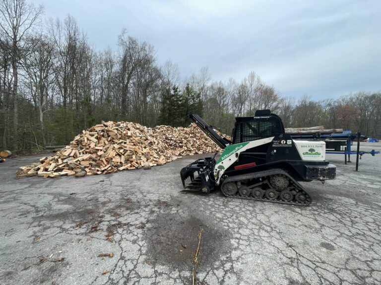 Small Heavy Duty Machinery With Piles of Wood